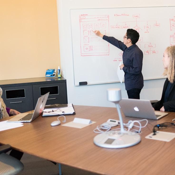 Mobile app project planning workspace with devices and development tools